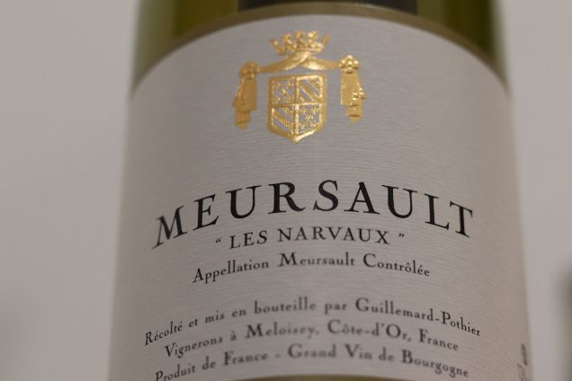A bottle of Meursault Les Narvaux from Domaine Guillemard-Pothier, a prestigious white Burgundy wine located just minutes from Beaune.