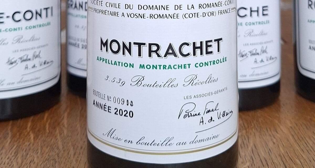 Close-up of the label on a Domaine de la Romanée-Conti Montrachet Grand Cru 2020 white wine bottle